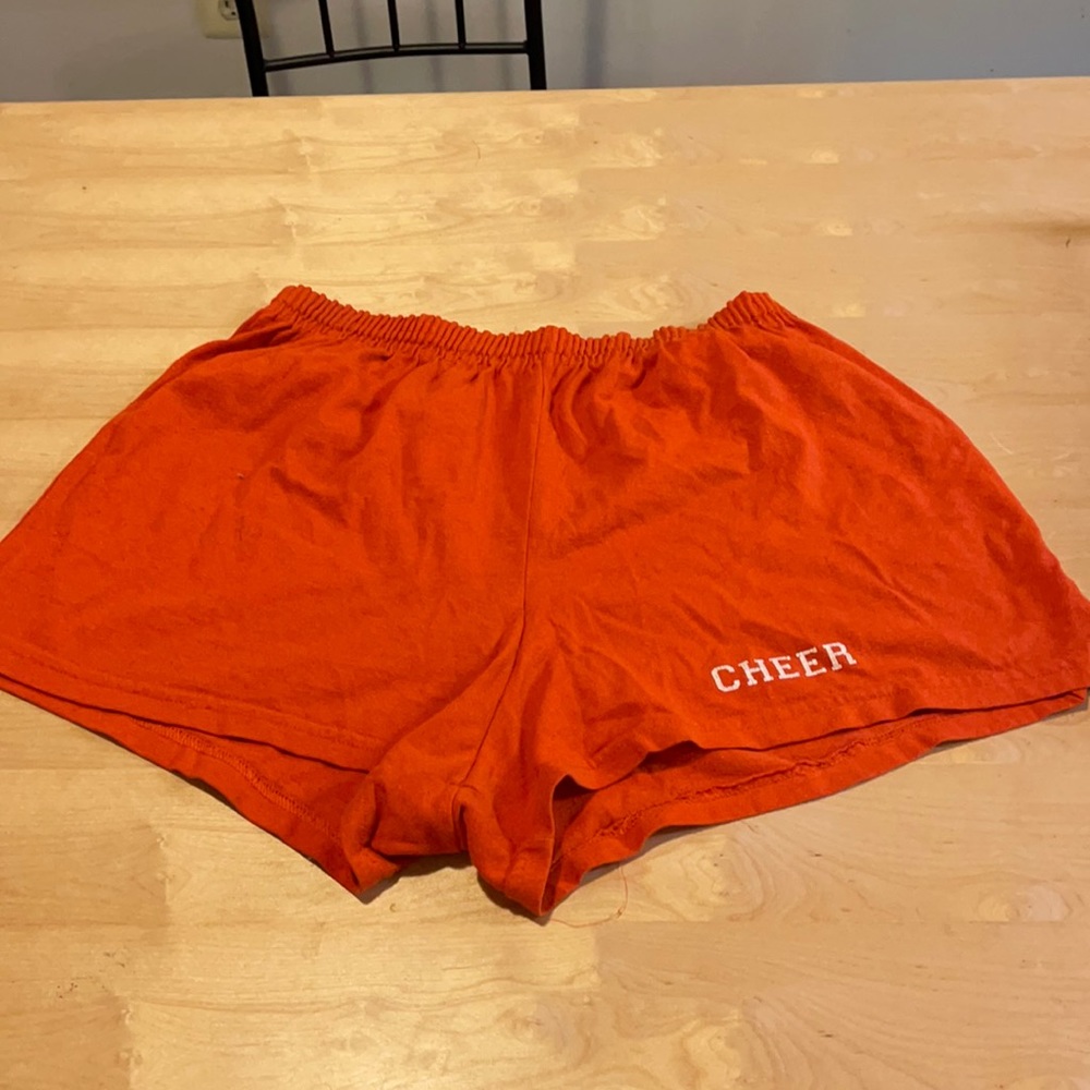 Augusta sportswear athletic shorts with “cheer” on leg